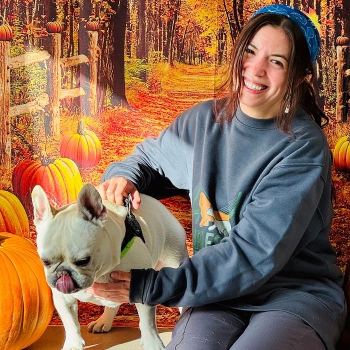 Emily with a white frenchie